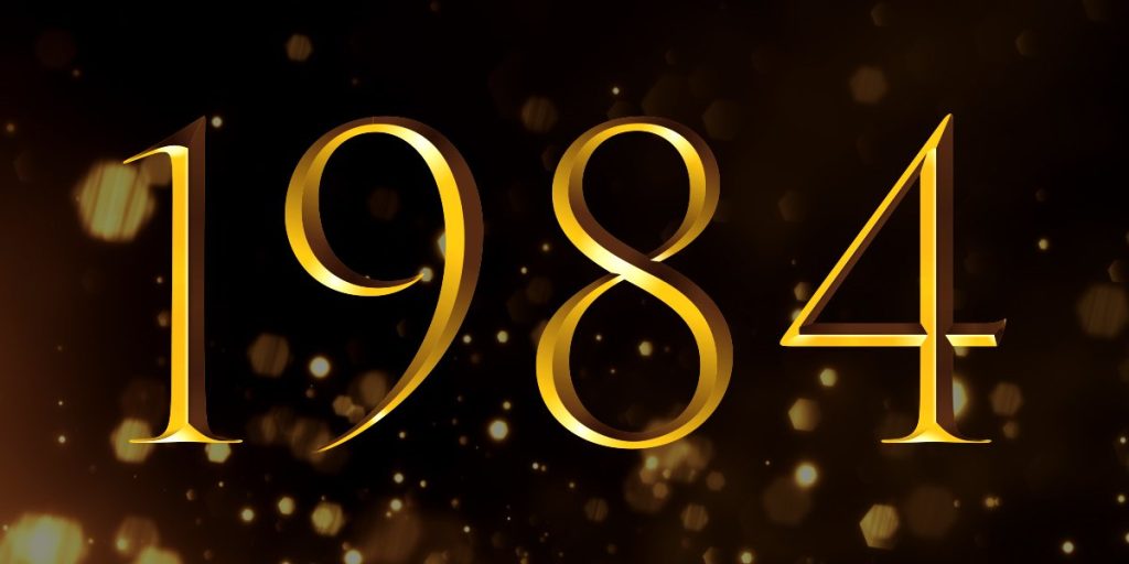 Gold numbers "1984" on a dark background with shimmering golden particles, celebrating the Olivier Winners of 1984.