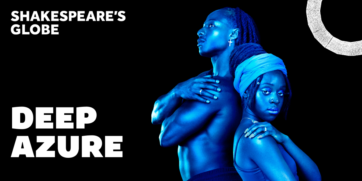 A sleek, modern office space with blue accents, featuring a glass desk and contemporary furniture.