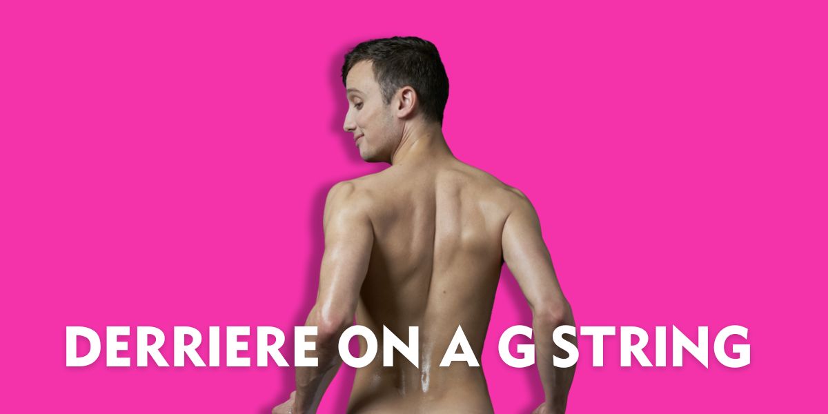 A man poses with his back to the camera, against a bright pink background, showcasing his physique.