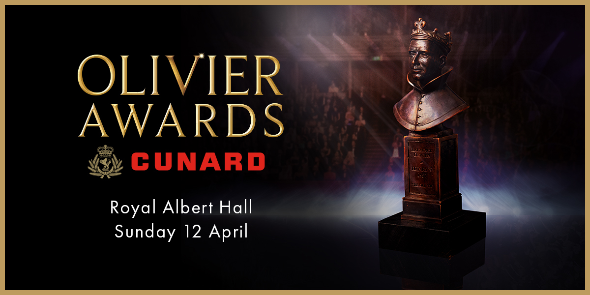 A bronze bust of a man wearing a crown, with "Olivier Awards" text above, set against a blurred audience.