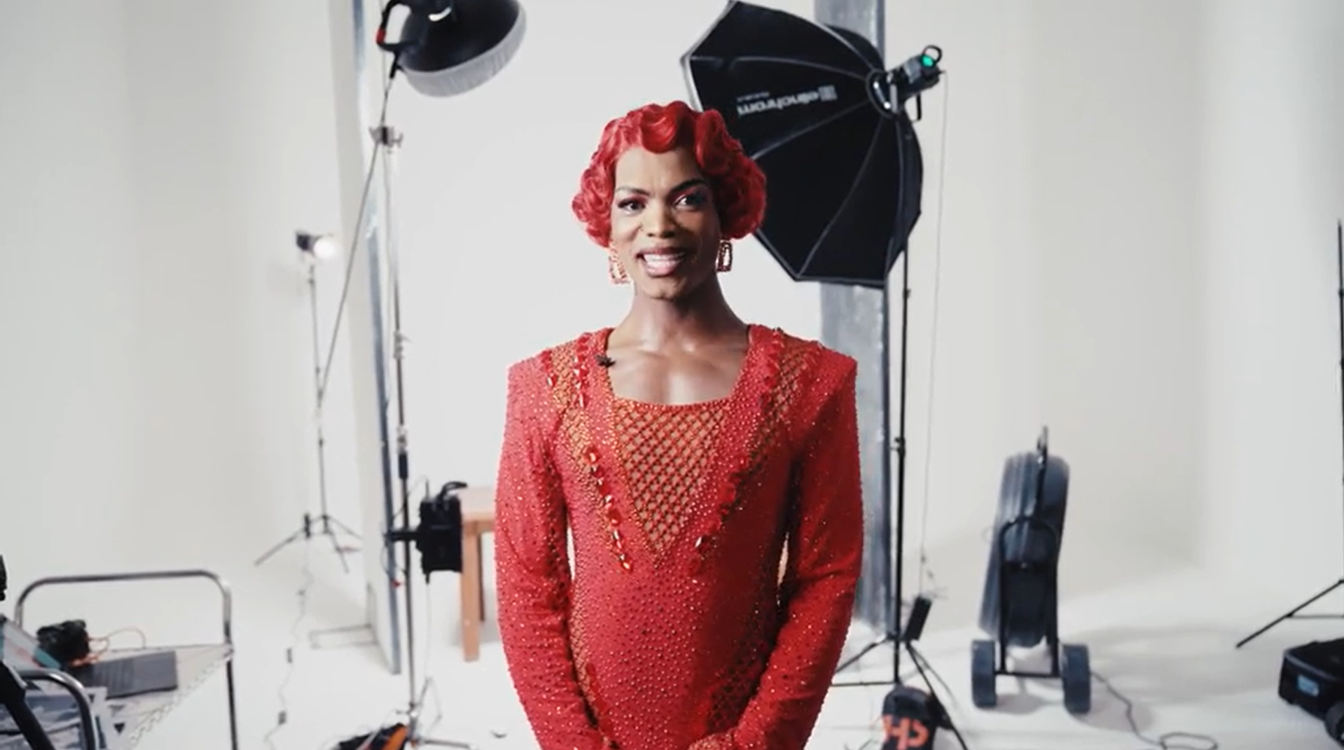 A vibrant poster for "Kinky Boots" featuring colourful boots and bold text announcing the upcoming New Year Sale.